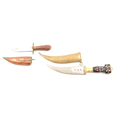 Lot 195 - Two Arabic dress knives in sheaths.