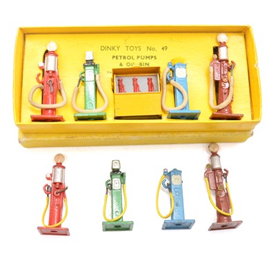 Lot 30 - Dinky Toys model 49 Petrol Pumps set, boxed and four loose petrol pumps.