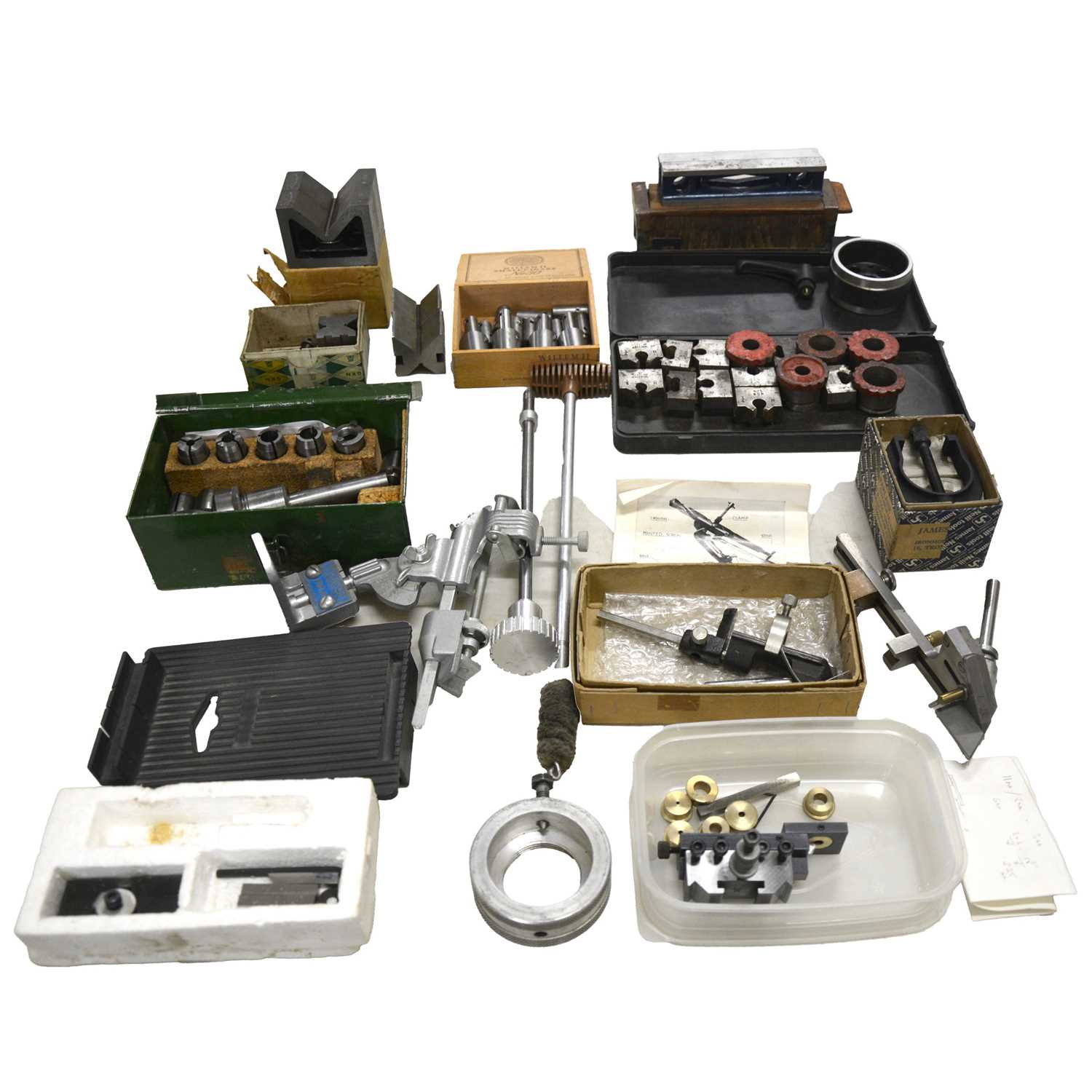 Lot 212 - Miscellaneous tools, including collets, drill grinding jigs, tap and die sets, vee blocks and clamps, etc.