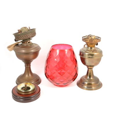 Lot 61 - Two oil lamps, one milk shade one, cranberry, hanging light shade.