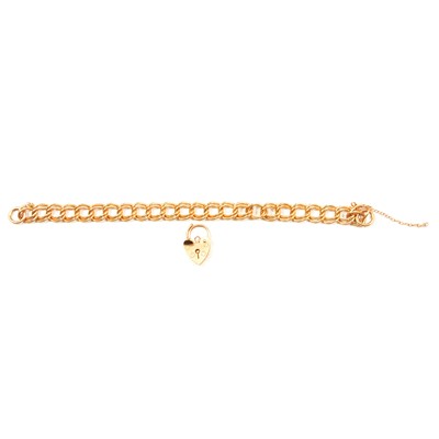 Lot 265 - A 9 carat yellow gold curb link bracelet.