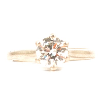 Lot 69 - A diamond solitaire ring.