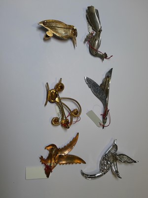 Lot 475 - Thirty-four vintage bird brooches and dress clips, 1930’s and later.
