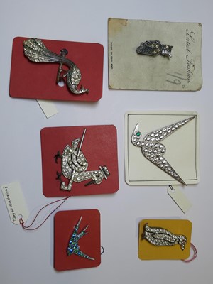 Lot 475 - Thirty-four vintage bird brooches and dress clips, 1930’s and later.