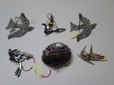 Lot 475 - Thirty-four vintage bird brooches and dress clips, 1930’s and later.