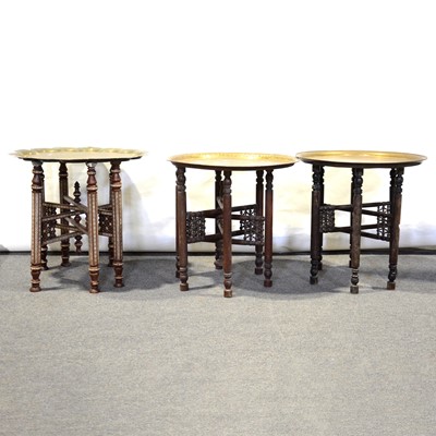 Lot 491 - Three brass topped occasional tables