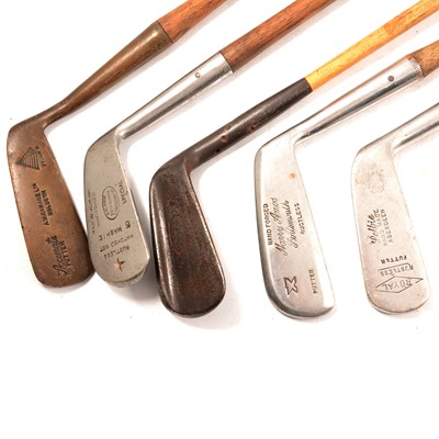 Lot 409 - A collection of hickory shafted golf clubs.