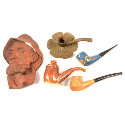 Lot 225 - A collection of pipes and other smoking related items.