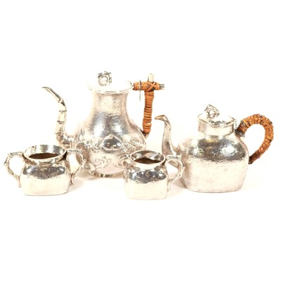 Lot 747 - Chinese silver matched three piece tea set and an associated hot water pot