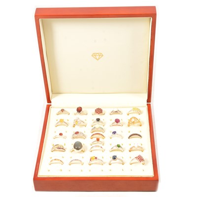 Lot 397 - Twenty-seven gemset silver rings, andalusite, garnet, opal, ruby and others.
