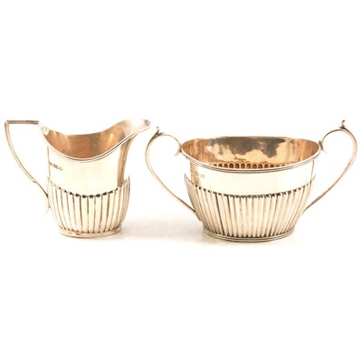 Lot 262 - A silver milk jug and sugar bowl, Mappin & Webb, Sheffield 1924.