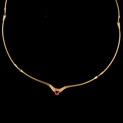 Lot 166 - A 14 carat yellow gold collar necklace set with rubies and diamonds.