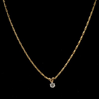Lot 174 - A diamond pendant and chain.