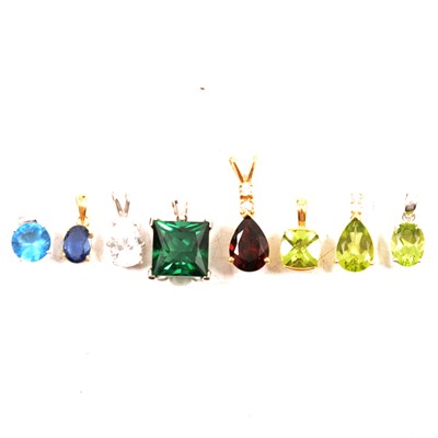 Lot 193 - Eight coloured stones in pendant mounts.