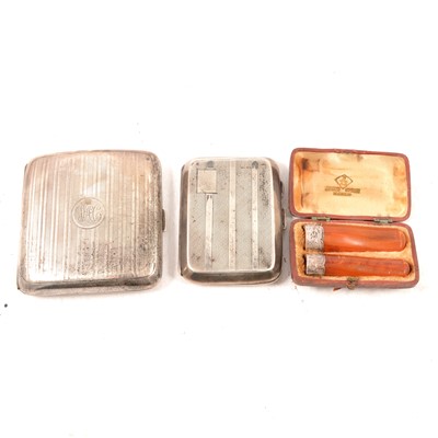 Lot 337 - Two silver cigarette cases and a pair of amber cigar and cheroot holders.