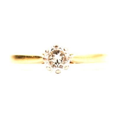 Lot 74 - A diamond solitaire ring.