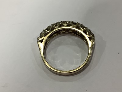 Lot 61 - A diamond half eternity ring.
