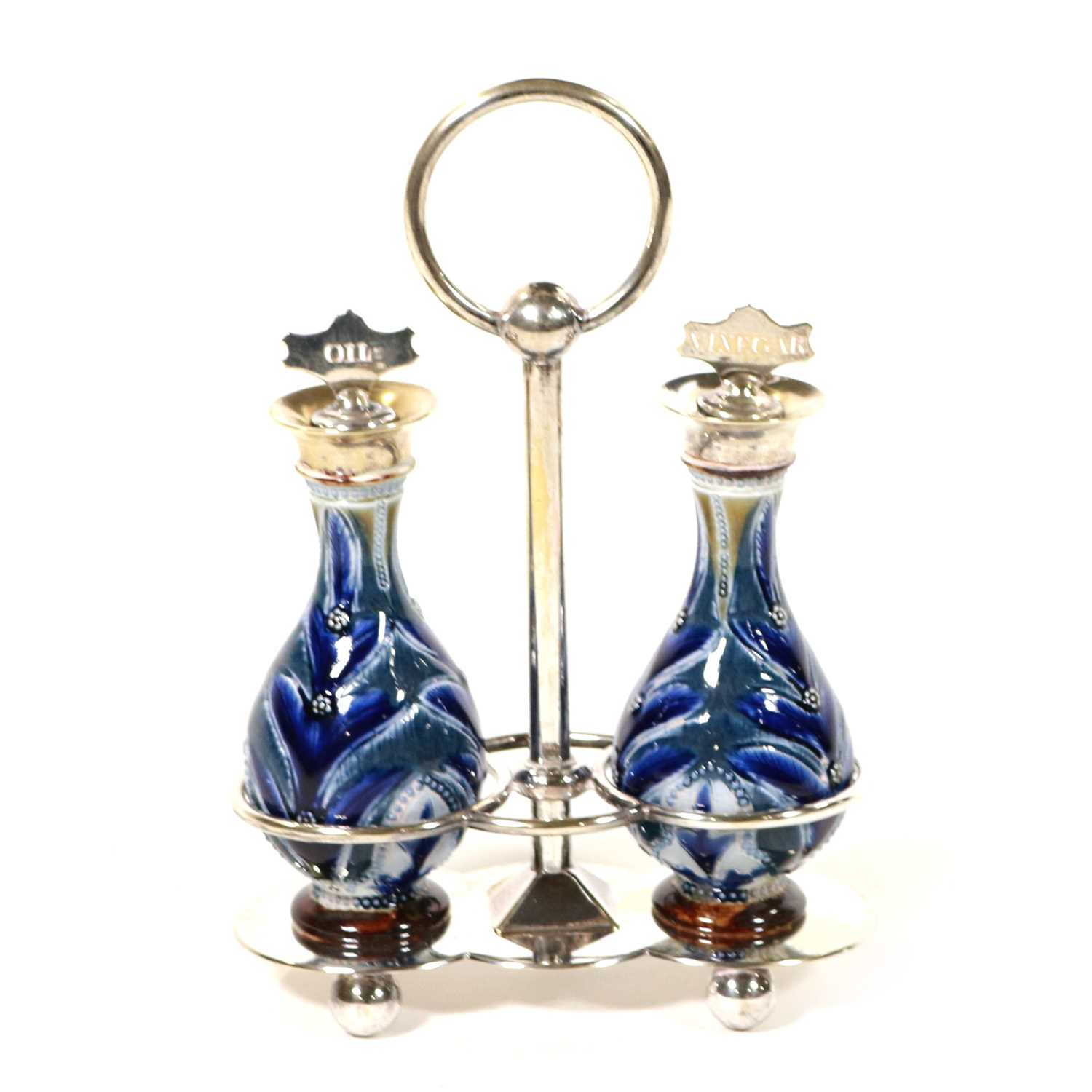 Lot 687 - Doulton Lambeth, a two-bottle stoneware Oil and Vinegar bottle set, designed by Clara Barker, 1879