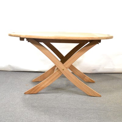 Lot 150 - Small teak folding oval-top garden table