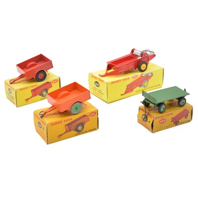 Lot 29 - Four Dinky Toys die-cast models including 312 Massey-Harris manure spreader