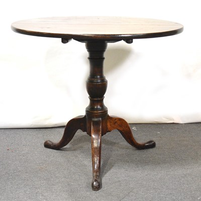 Lot 321 - George III oak and elm tilt top tripod table