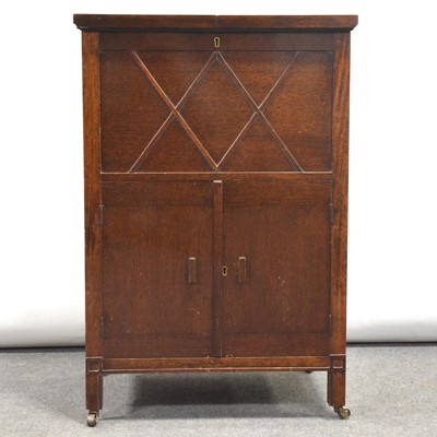 Lot 487 - Edwardian walnut metamorphic cocktail cabinet