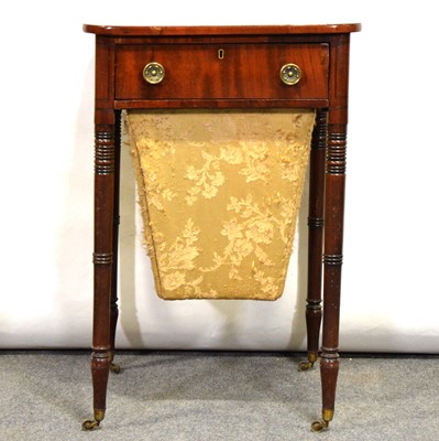 Lot 518 - George III mahogany sewing table