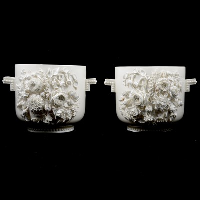 Lot 17 - Pair of large blanc de chine floral jardinieres, in the style of Belleek