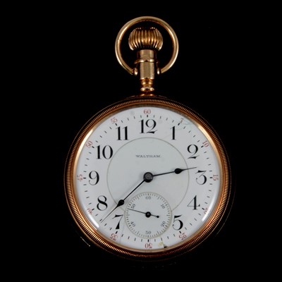 Lot 356 - Waltham - a yellow metal open face pocket watch.