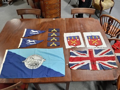 Lot 128 - Box of various military flags and pennants