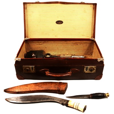 Lot 124 - Two suitcases and contents including bayonet and sword scabbards, kukri, etc.