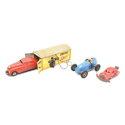 Lot 278 - Clock-work model cars, three including Schuco garage with 1750 car