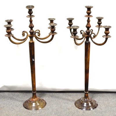 Lot 498 - Pair of contemporary metal five-light candelabra.