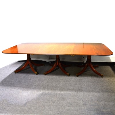 Lot 521 - Regency style mahogany triple pedestal dining table, with additional leaves