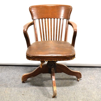 Lot 519 - 1940's oak office chair.