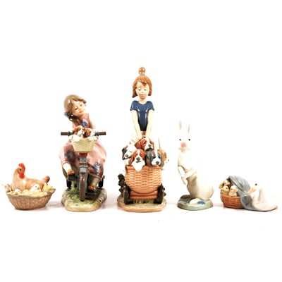 Lot 8 - Five Lladro and Nao figurines.
