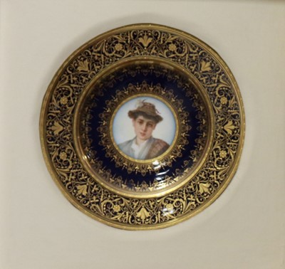 Lot 46 - After Adriano Bonifazi four Vienna porcelain mounted plates.