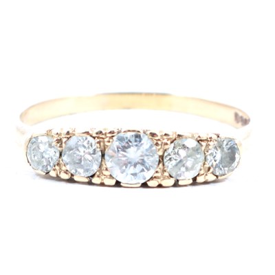 Lot 193 - A diamond five stone ring.