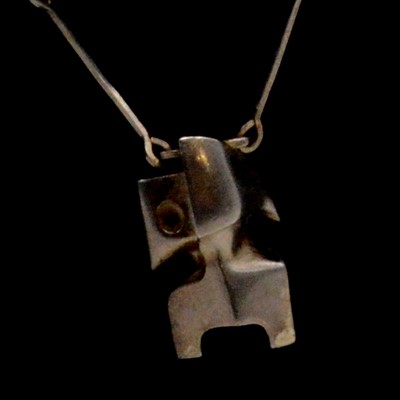 Lot 207 - Bjorn Weckstrom for Lapponia - a futuristic silver pendant and chain named "Zombi".