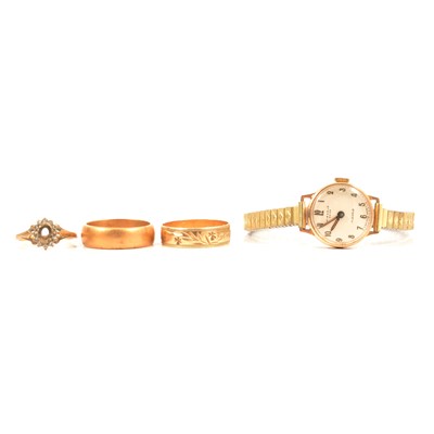 Lot 141 - Two wedding rings, ring without a stone and lady's 9 carat yellow gold wristwatch.