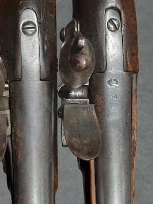 Lot 169 - Two 19th century flintlock pistols, and a Belgian pinfire revolver