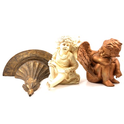 Lot 409 - Three composite cherub models and a wall bracket