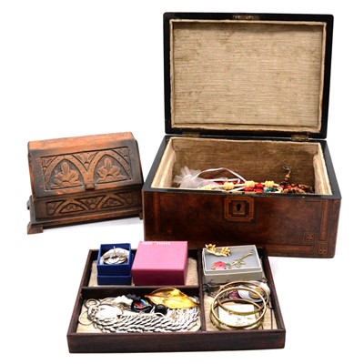 Lot 496 - A collection of costume jewellery in a walnut jewel box and oak small-scale bureau.