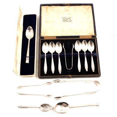 Lot 246 - A cased set of silver teaspoons, sugar tongs and other loose spoons.