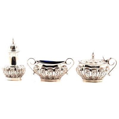 Lot 242 - A silver three piece condiment set, Walker & Hall, Sheffield 1900/1901.