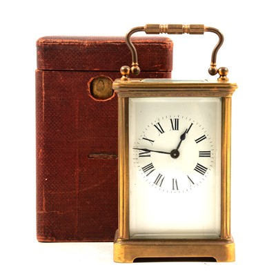 Lot 174 - An eight-day brass-cased carriage clock with travelling case