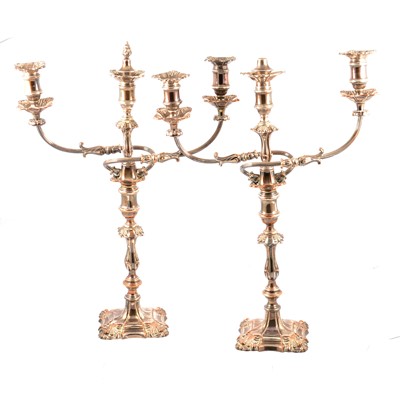 Lot 239 - Pair of large electroplated three-light candelabra.