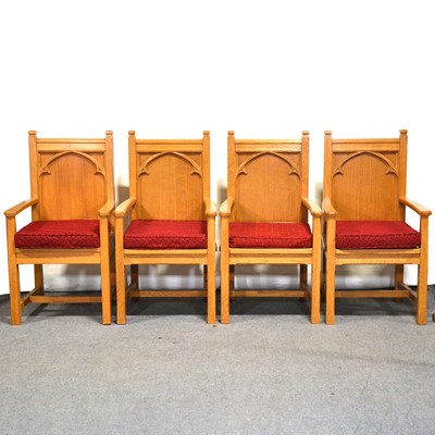 Lot 132 - Four Ecclesiastical oak elbow chairs, Gothic style