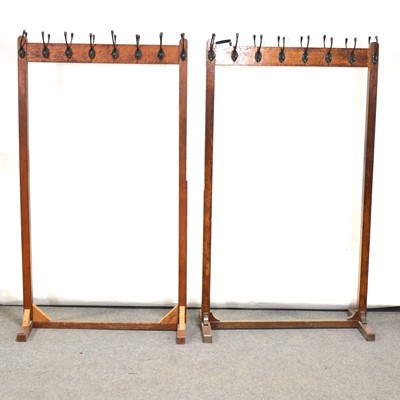 Lot 121 - Two Edwardian oak coat rails/ racks