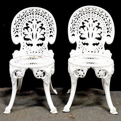 Lot 513 - Two white aluminium patio tables and four chairs